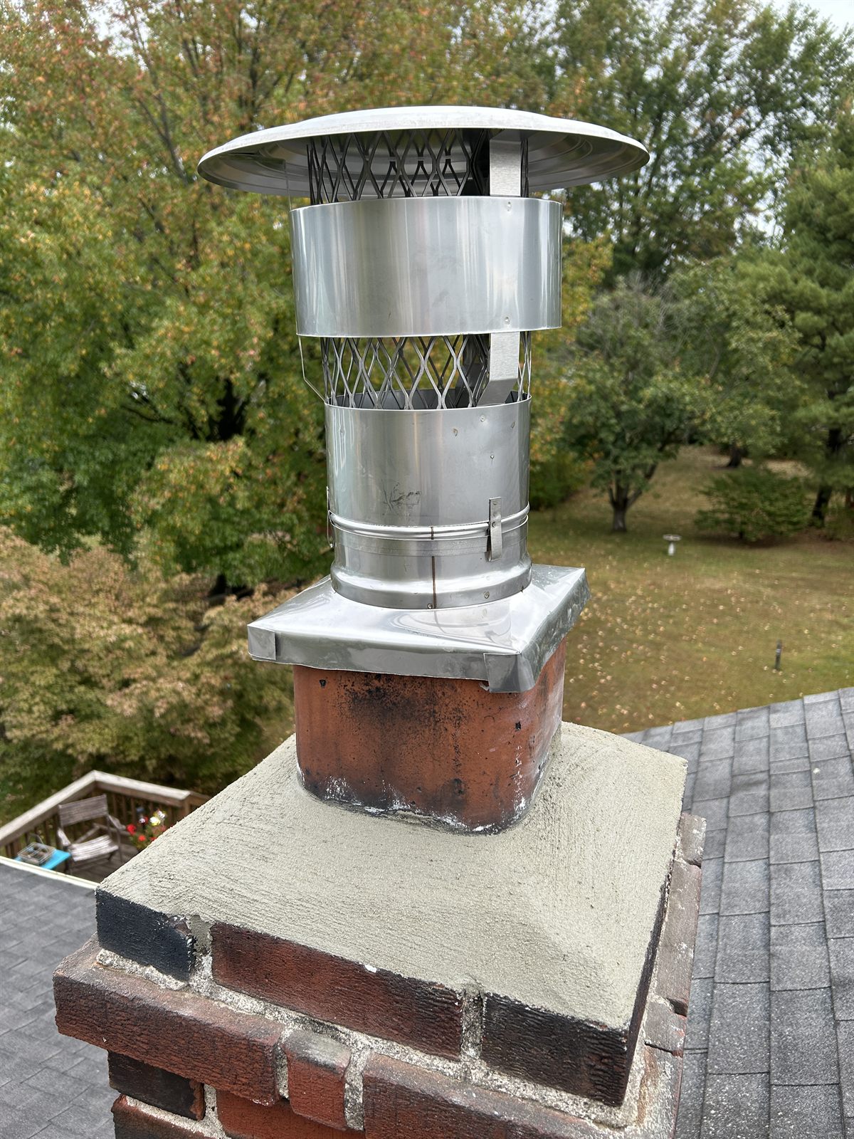 Finished chimney relining with new stainless cap and crown