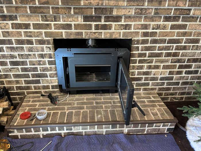 Fireplace insert installation