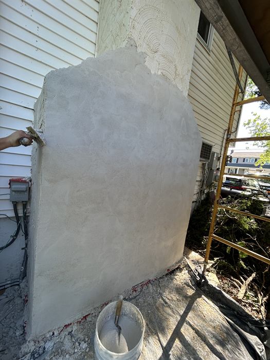 Stucco chimney repair